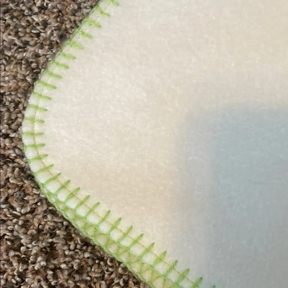 White and Green Baby Blanket with Giraffe Design